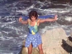 Short Haired Beauty Teasing On The Beach